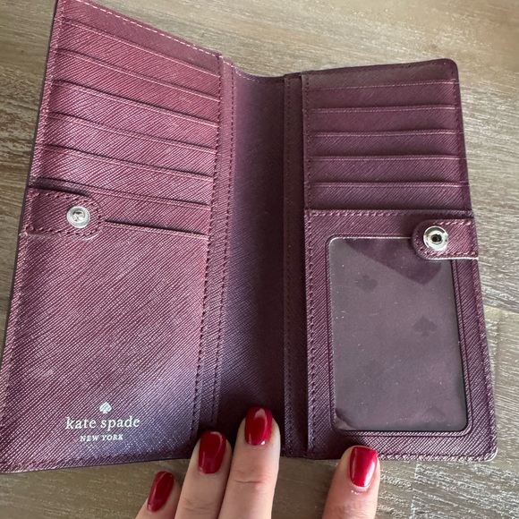 Kate Spade pebbles leather bifold wallet with snap closure. - Picture 9 of 10